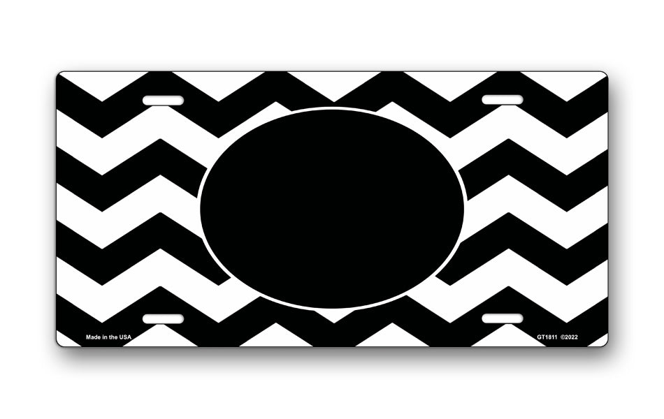 Black Oval and Chevron on White License Plate